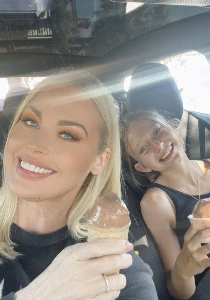 Cynthia Garcia and her daughter, Rain, eating ice cream knowing that who you become is determined by who you BE, not what you DO.